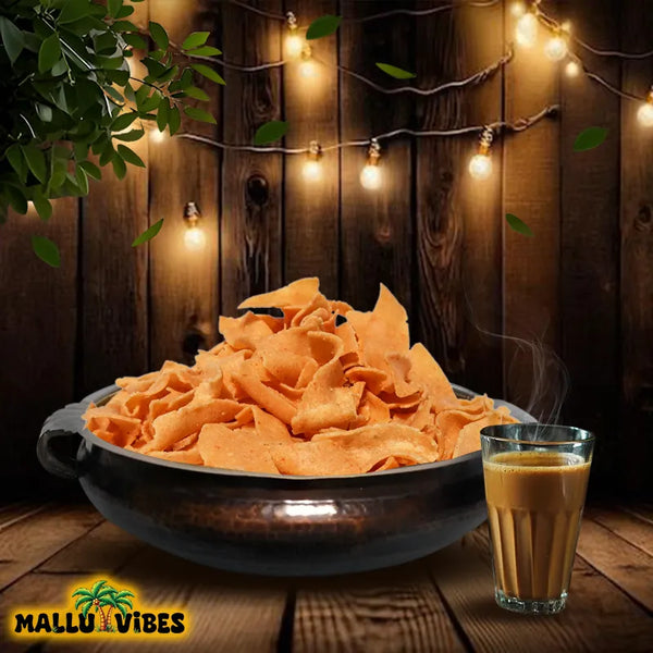 Authentic Kerala snacks pakkavada in a bowl, english - Homemade Kerala snacks ribbon shaped pakkoda