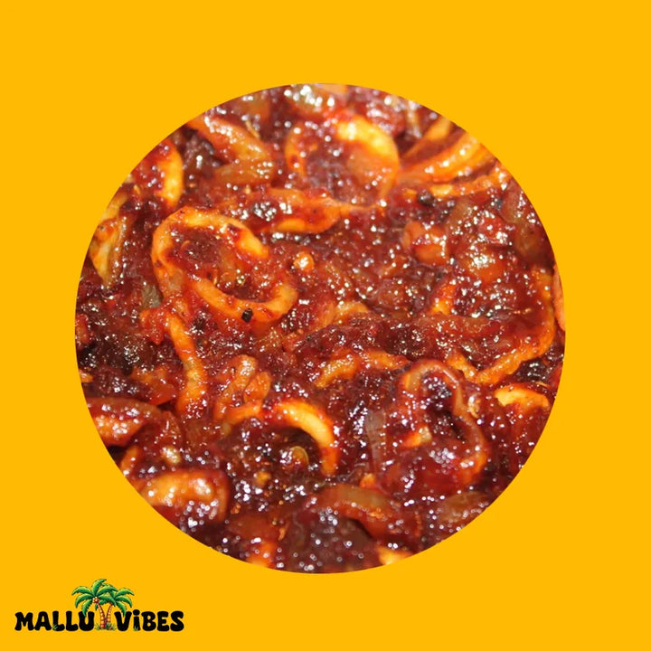 Top view of seafood squid pickle in a Kerala pickles rich spice blend with Homemade Kerala pickles, and No Preservatives, malayalam - Homemade Fresh kanava achar